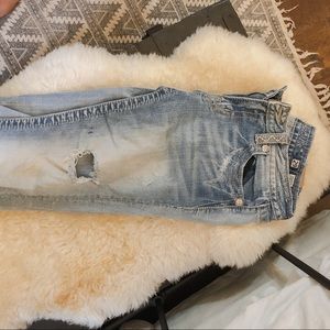 Light wash distressed Miss Me jeans